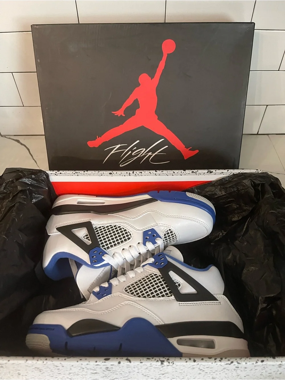Men’s Retro 4 Motorsports Size 5.5.